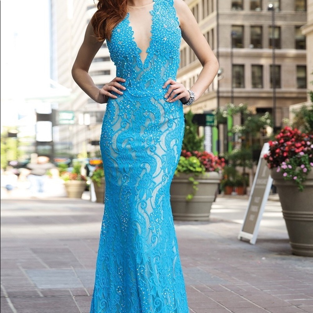 Jovani blue rhinestone v cut gown with cutout back